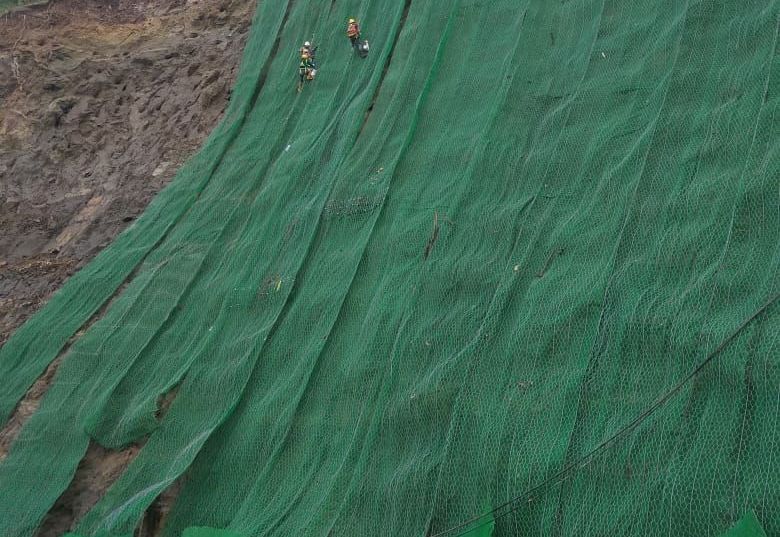 ROCKFALL PROTECTION FOR NARINGGUL ACCESS ROAD WITH SIMPLE DRAPERY