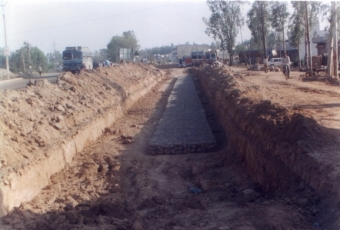 TERRAMESH REINFORCED SOIL WALL TO APPROACH A RAILWAY OVER BRIDGE (