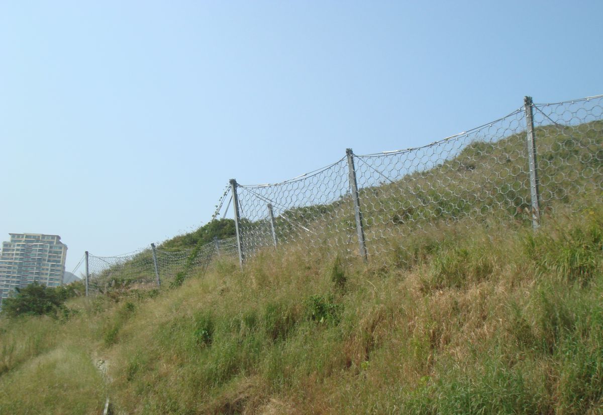 DEBRIS FLOW BARRIER AT DISCOVERY BAY NORTH DEVELOPMENT: TOWN PLAZA